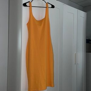 Zara mid length orange dress. Brand new,never worn